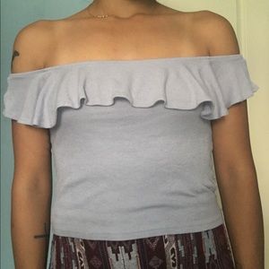 Cropped, over the shoulder periwinkle colored top
